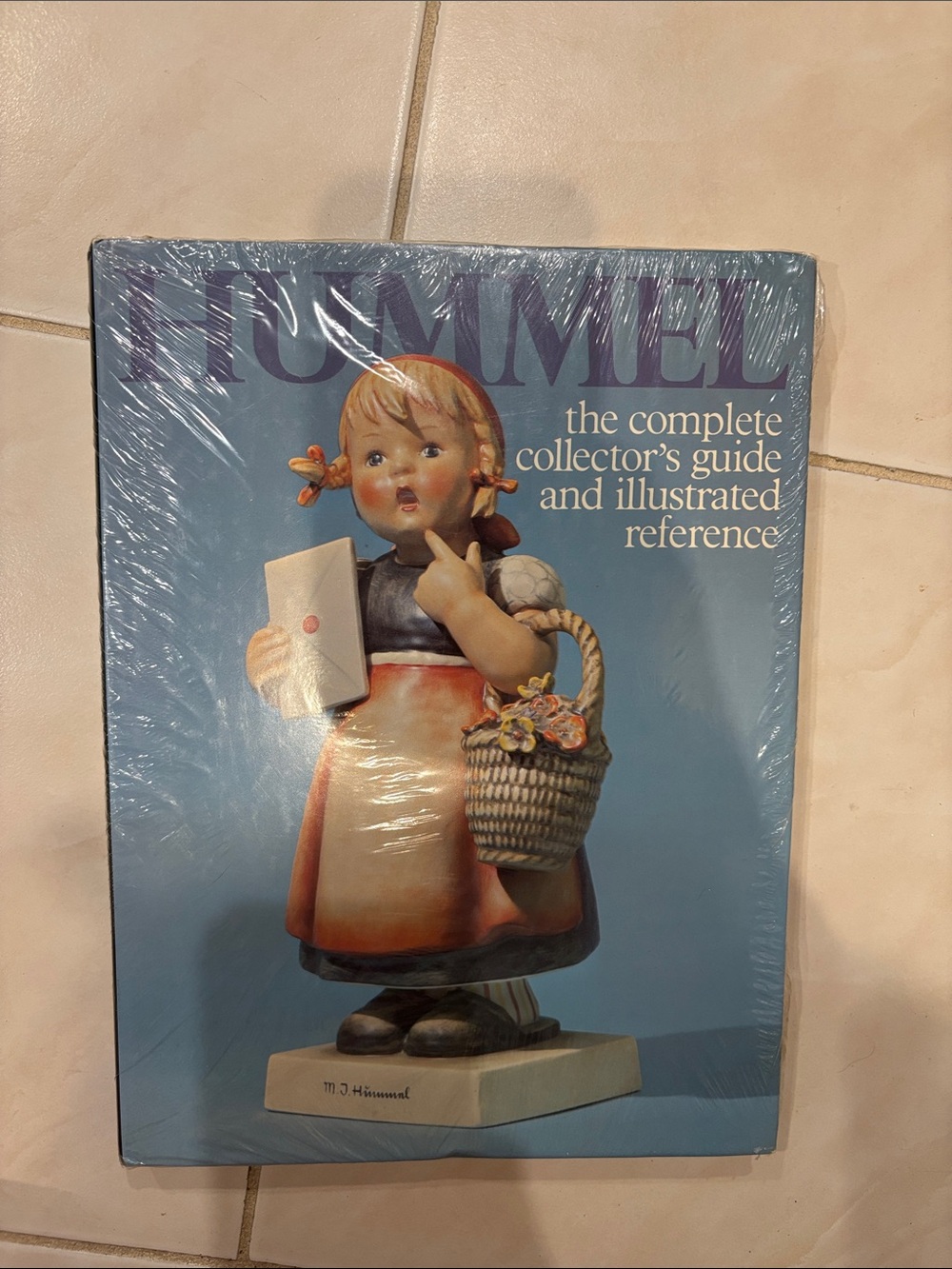Hummel Blue Cover Collector's Guide with Figurine Illustration